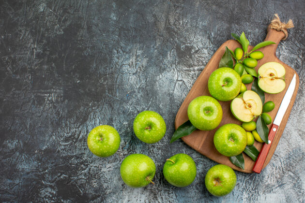 健康远眺苹果砧板上的开胃苹果刀健康可食用水果刀
