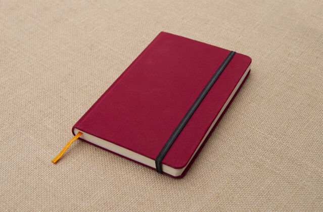 质量织物表面的红色笔记本朴素纹理模型