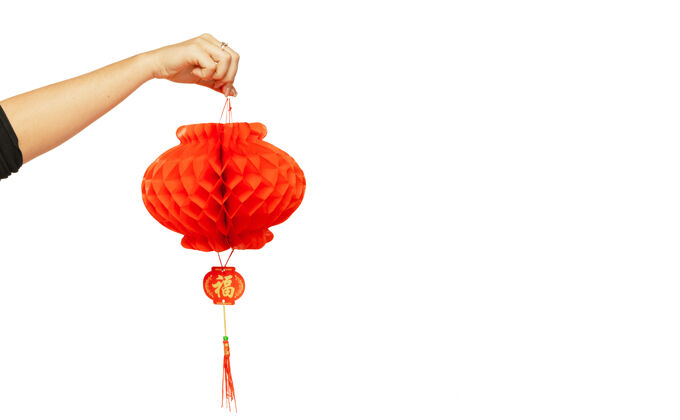 新年2020年中国新年快乐白色工作室背景上 女性手持红灯笼庆祝 装饰 节日概念广告版面火花节日红色
