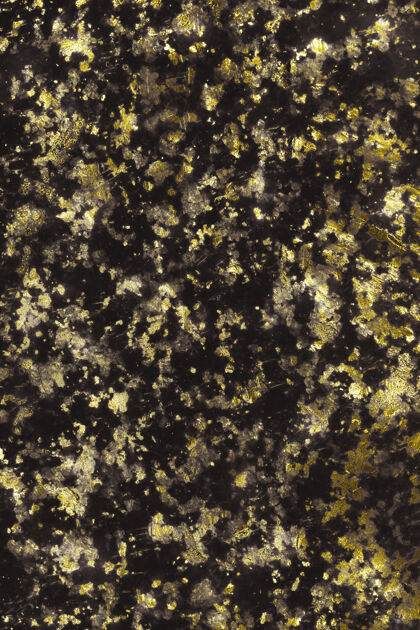空旷黄色和黑色纹理结构花岗岩表面