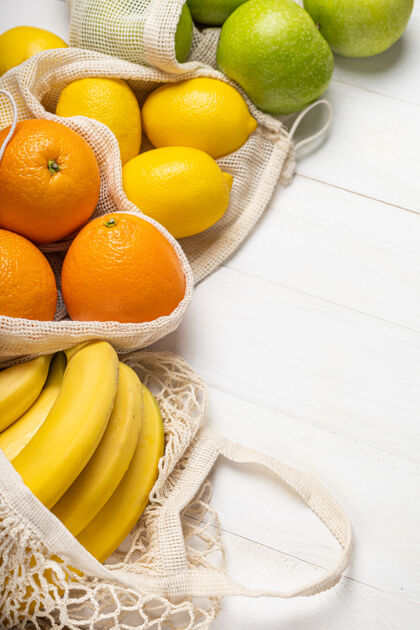 杂货新鲜水果 苹果 香蕉 橘子和柠檬在环保袋维生素购物袋配料