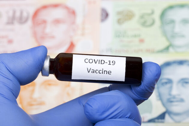 冠状病毒新加坡元背景下的covid-19疫苗针头药品大流行