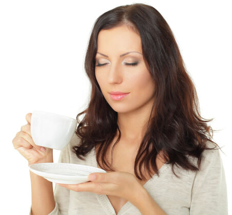 饮料一个拿着咖啡杯的女人肖像杯子咖啡
