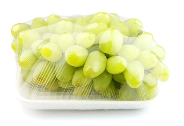 聚乙烯真空包装的甜葡萄放在白葡萄上市场甜点美味