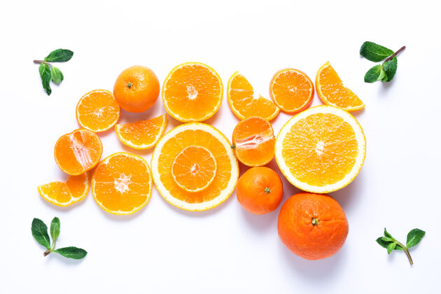 热带一组切好的橘子和橘子 白色的薄荷叶细节异国情调美味