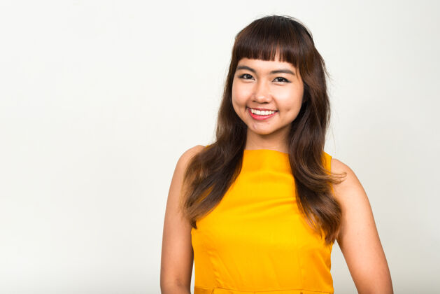 东南年轻漂亮的亚洲女人对抗白色空间泰国女性发型
