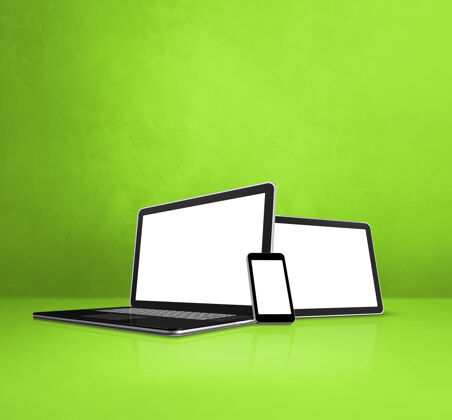 屏幕绿色办公桌上的笔记本电脑 手机和数字平板电脑灯光绿色手机
