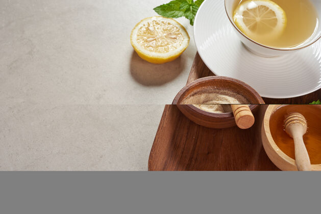 杯子姜茶配料 健康舒适 加热茶配方简单姜茶和配料-柠檬 蜂蜜俯视图平面图从家里新鲜生长的有机花园食品概念调味品叶子辛辣