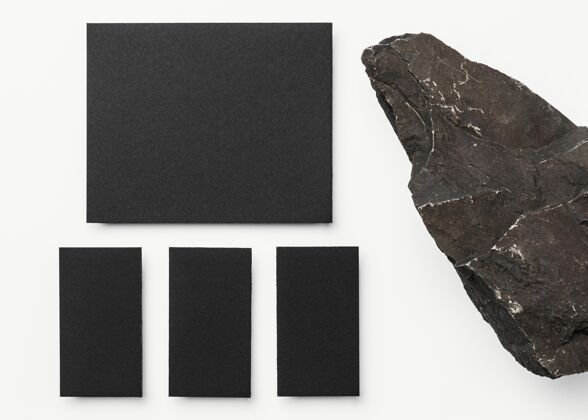 纸板用深色石头做的文具模型模型水平名片