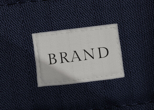 服装品牌服装标签模型在最小的黑色和白色Mockup织物纹理FashionBrand