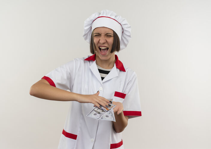 制服快乐的年轻女厨师穿着厨师制服 手里拿着白色的钱快乐年轻女