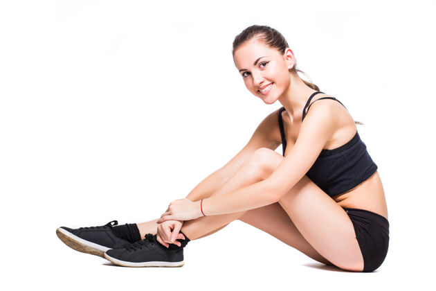 健身房健身女做伸展运动隔离在白色背景瑜伽伸展体重