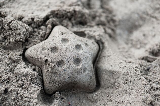 形状特写镜头的海星一样的数字湿沙热带生命水