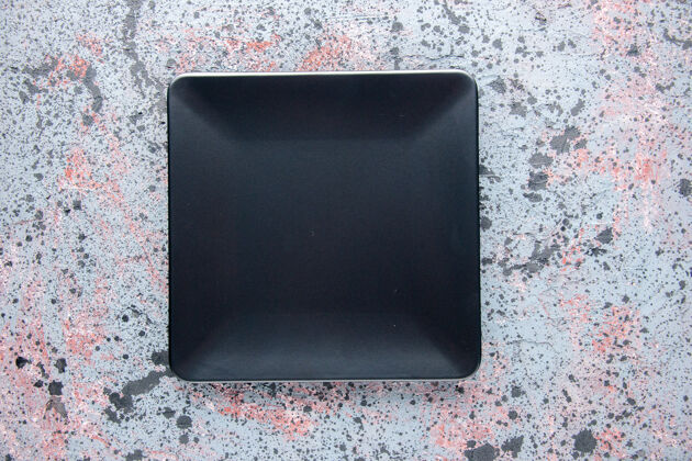 颜色顶视图浅背景黑色方形板餐具晚餐餐盘彩色餐桌餐厅灯光垃圾年龄