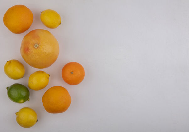 视野顶视图复制空间葡萄柚与橘子和柠檬的白色背景柠檬葡萄柚空间