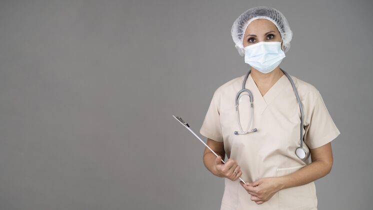 口罩戴着面具的中弹医生卫生工作者职业健康