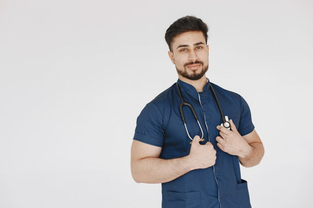 国际国际医学生穿蓝色制服的人带听诊器的医生工人医生工作