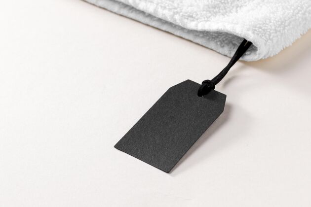 字符串柔软毛巾织物上的服装模型标签模拟悬挂标签