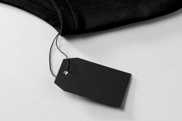 包装衣服大小黑色模拟高视图和黑色毛巾标签销售徽章