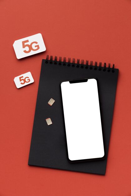 5g带智能手机和sim卡的笔记本俯视图笔记本速度创新